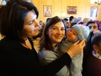 25 de copii botezați