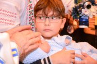 25 de copii botezați