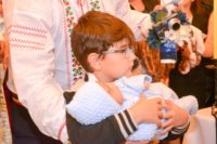 25 de copii botezați