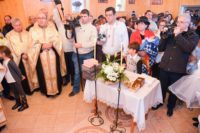 25 de copii botezați