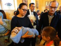 25 de copii botezați