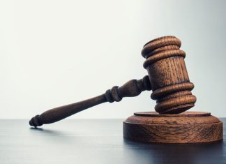 Bărbat trimis în judecată și menținut în arest preventiv pentru violență în familie și amenințări