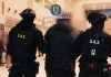 Bărbat din Bacău, escortat de polițiști la Aeroportul Henri Coandă pentru extrădare în SUA